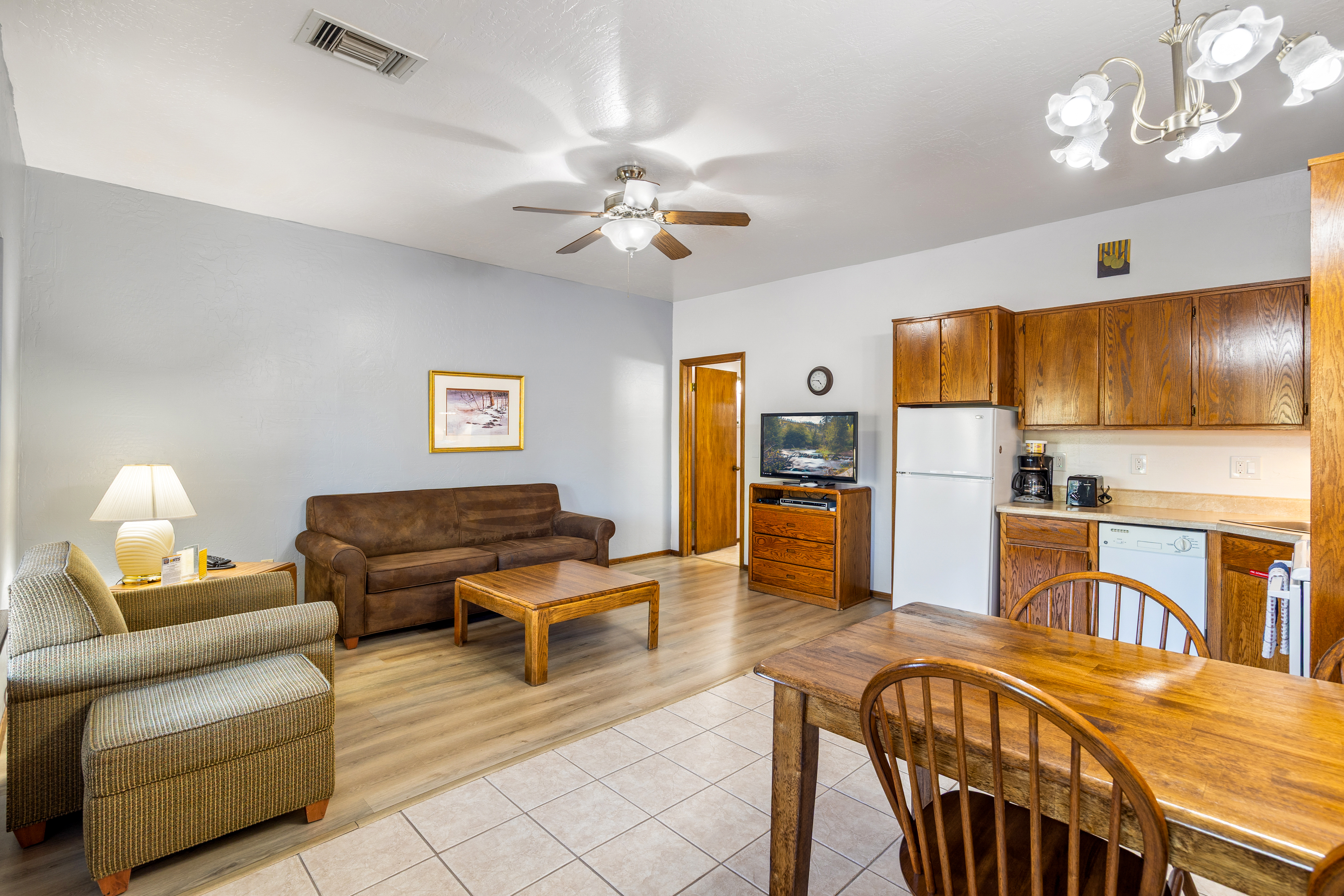 One bedroom unit with open living area, dining, and kitchen